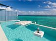 Maledivy-Amilla-Fushi-Sunset-Water-Villa-Overwater-Pool